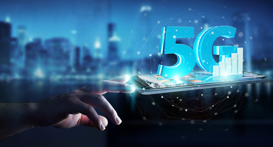 Businessman on blurred background using 5G network with mobile phone 3D rendering